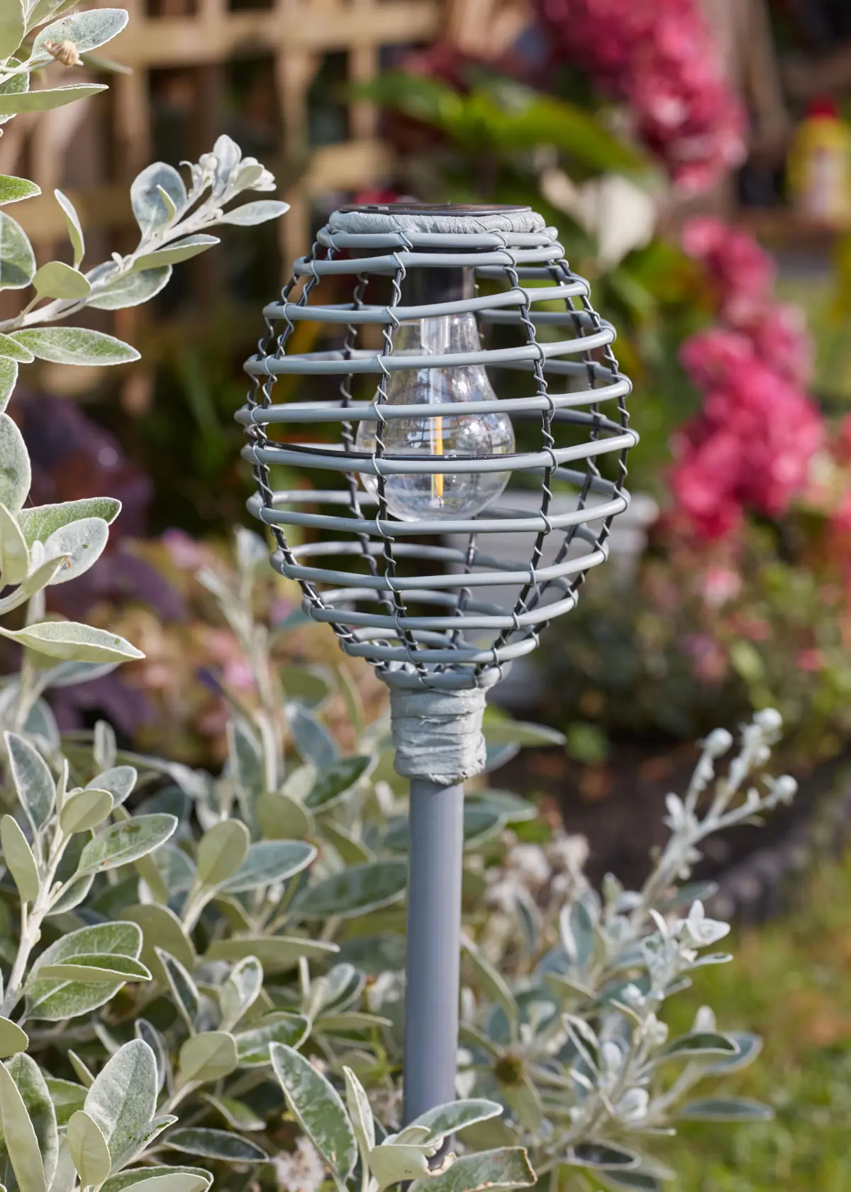 A photo of Lumina Faux Rattan Stake Slate