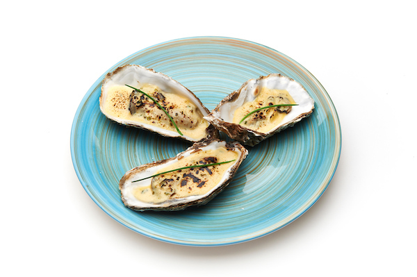 Gegratineerde oester met champagnesaus
