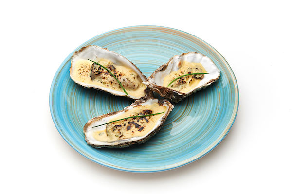Gegratineerde oester met champagnesaus